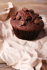 Chocolate muffin and coffee grains
