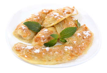 Sweetened fried banana on plate, isolated on white