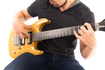 hispanic young man playing electric guitar