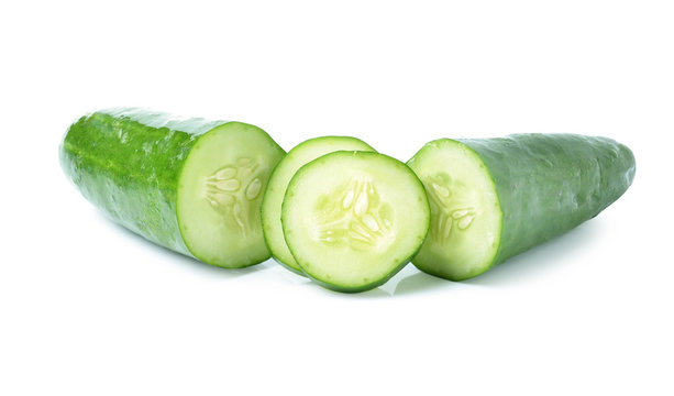 Cucumber and slices on  background.