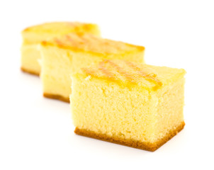 three pieces of sponge cakes on a white background
