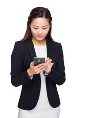 Fototapeta premium Business woman text on phone