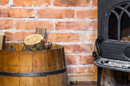 fire place and barrel with wood