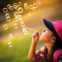 Blowing a soap bubbles