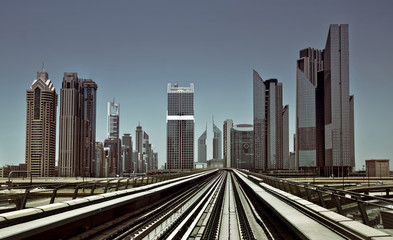 Fototapeta na wymiar Dubai metro tracks with skyline