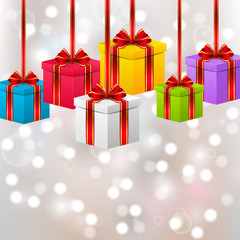 Birthday gift boxes on shiny background