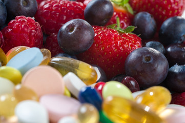 Healthy lifestyle, Fruit and pills, vitamin supplements