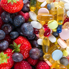 Healthy lifestyle, Fruit and pills, vitamin supplements