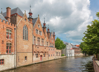 Fototapeta na wymiar Bruges - Look from Steenhouwersdijk street to canal