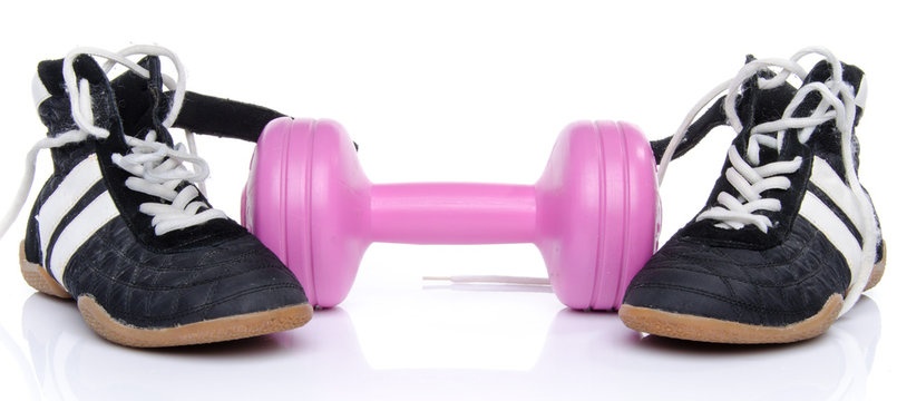 Pink dumbell and fitness shoes