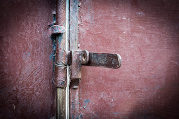 Closeup metal door with lock