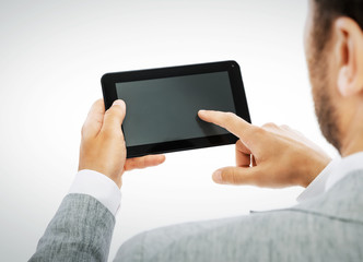 Male hands holding a tablet PC -including clipping path