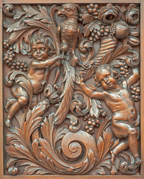 Beruges - carved relief of angels with the bird