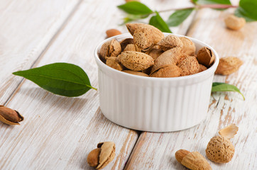 almond nuts on wooden table