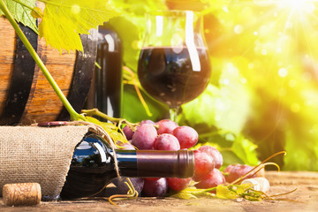 Red wine and grapes
