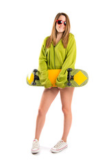 Skater with green sweatshirt over white background