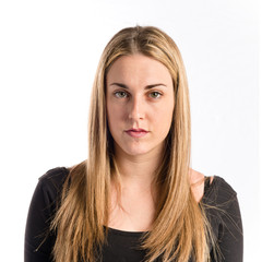 Naklejka premium Blonde girl over white background
