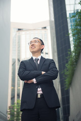 hong kong businessman in busy central district street