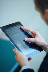 men holding digital tablet