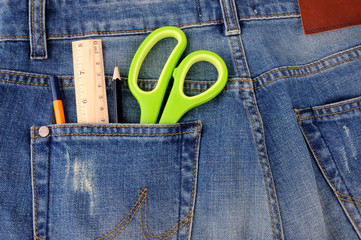 Office supplies on jeans pocket