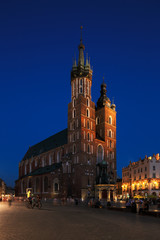 Naklejka na ściany i meble A night view of the Market Square in Krakow, Poland