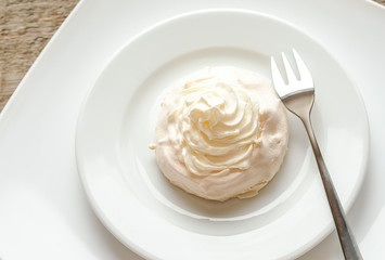 Meringue cake with whipped cream