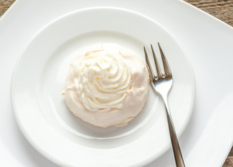 Meringue cake with whipped cream