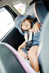 toddler in   car seat