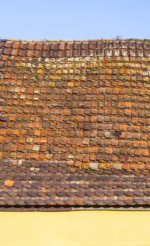 roof tile pattern over blue sky