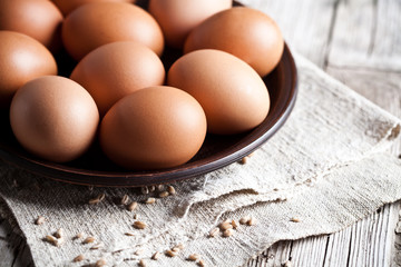 fresh brown eggs in a bowl