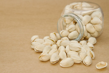 close up of a bottlel of pistachio nuts