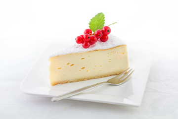 Cheesecake decorated with red currant