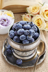 Silver bowl of blueberries