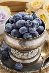 Silver bowl of blueberries