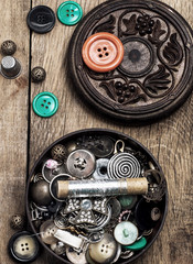 jewelry box with buttons and sewing accessories