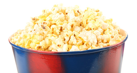 Popcorn in striped bucket isolated on white