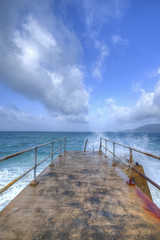 Ocean view and clouds on the bridge with heavy waves