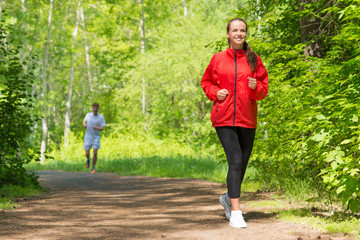 healthy young female athlete running