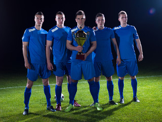 Fototapeta premium soccer players celebrating victory