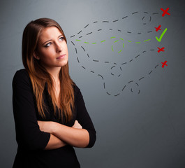 Young woman choosing between right and wrong signs