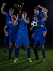 Naklejka premium soccer players celebrating victory
