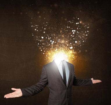 Business man with glowing exploding head
