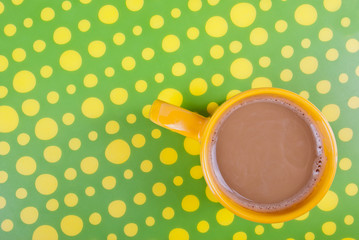 Coffee in green and yellow setting