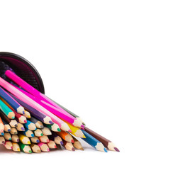 Drawing supplies: assorted color pencils, isolated on white back