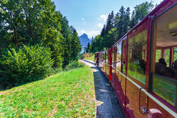 Steam locomotive of a vintage cogwheel railway going to Schafber