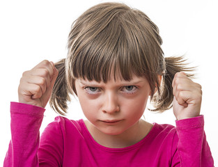 angry little girl on white background