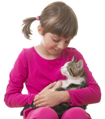 happly little girl holding a kitten © Vera Kuttelvaserova