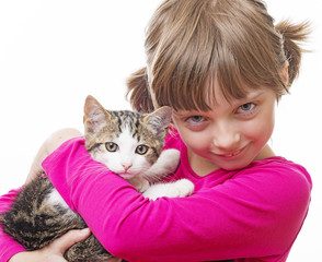 happly little girl holding a kitten