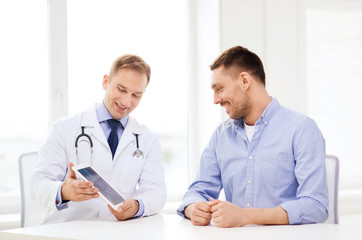 doctor with tablet pc and patient in hospital