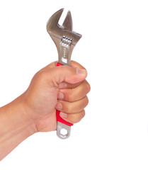 hand holding ajustable wrench